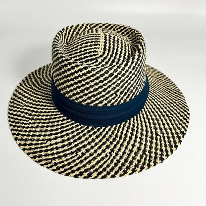 Wide-brim straw sun hat by Stevvex, navy band, black and natural woven pattern on Tampa Home & Garden Store