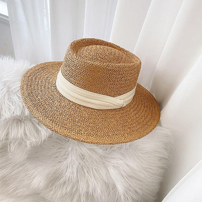 Straw fedora-style sun hat with wide brim and cream band on Tampa Home & Garden Store
