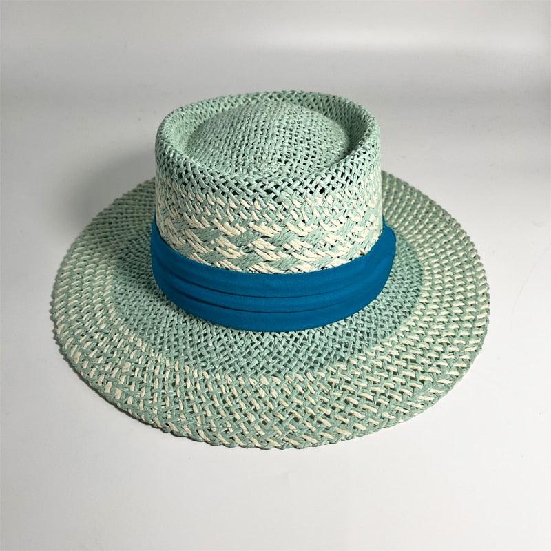 Stevvex straw sun hat with wide brim, light mint weave and blue ribbon band on Tampa Home & Garden Store