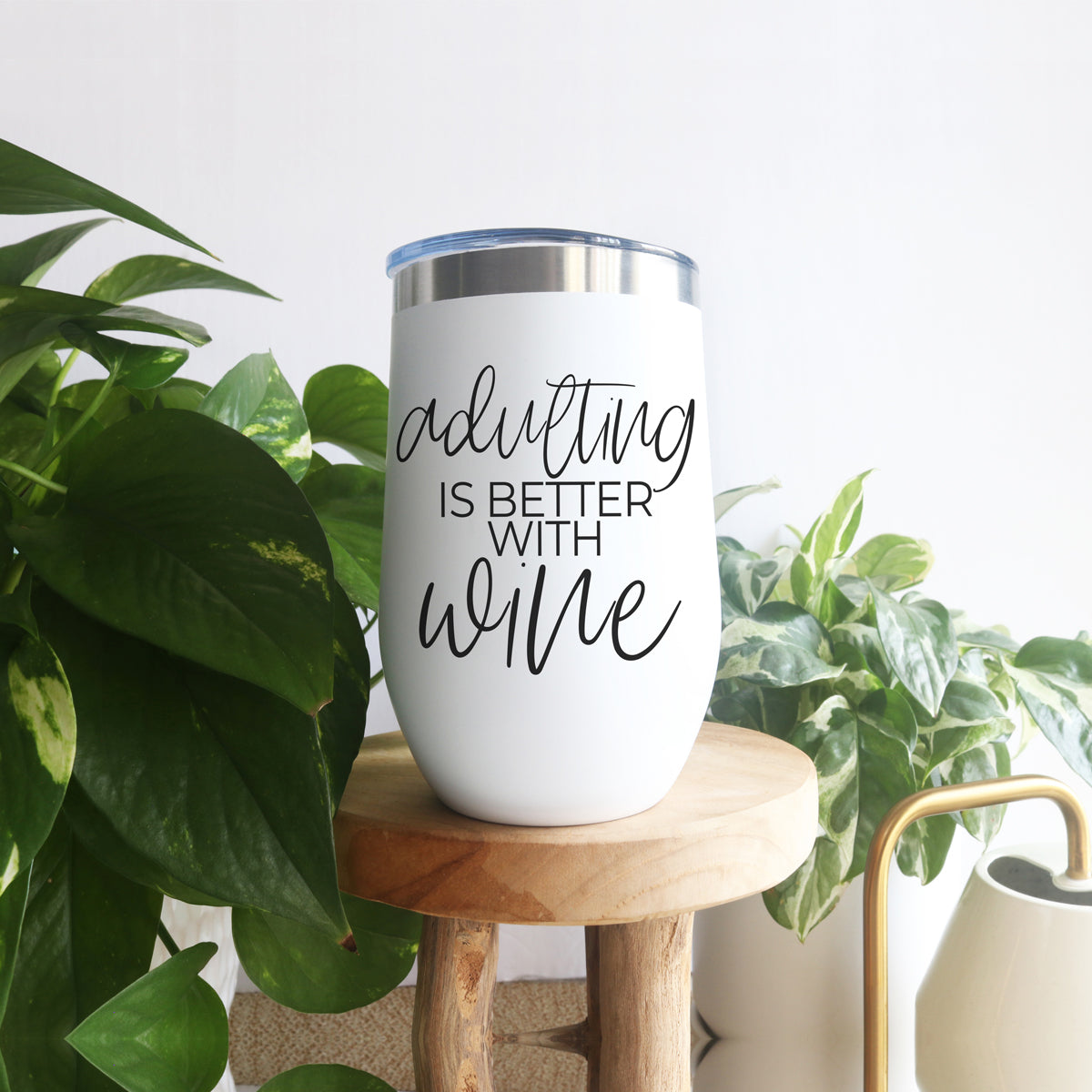 Adulting 17oz tumbler white with black script says adulting is better with wine on Tampa Home & Garden Store