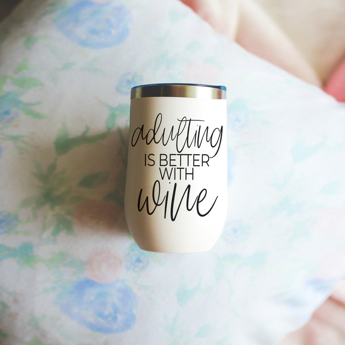 Adulting 17oz tumbler Gia Roma white matte with black script is better with wine and blue rim on Tampa Home & Garden Store