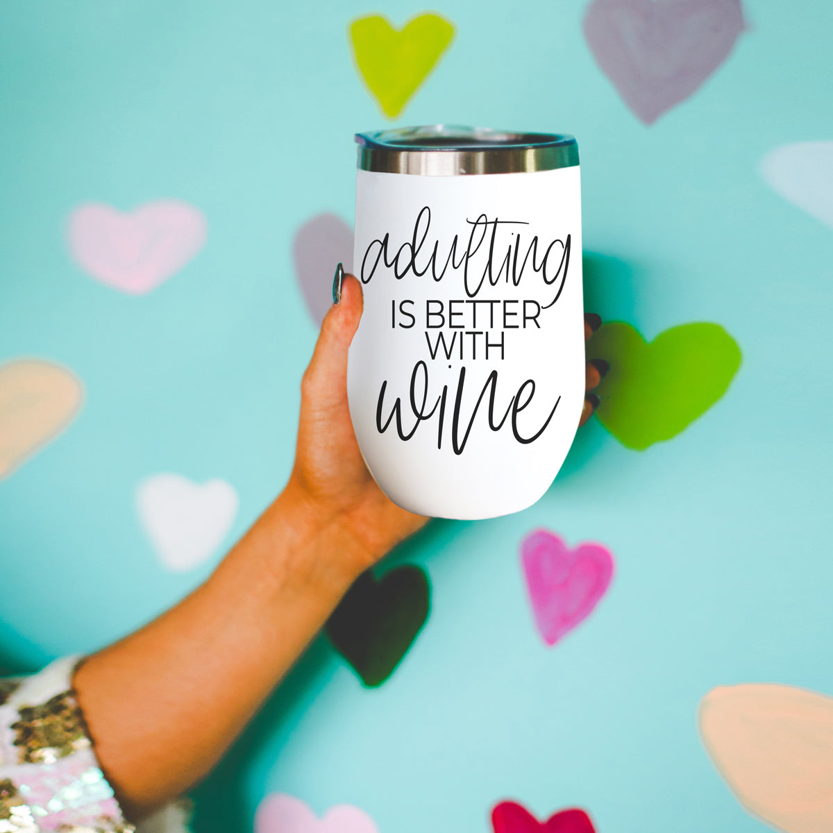 Adulting 17oz tumbler white cup with black script reading adulting is better with wine on Tampa Home & Garden Store