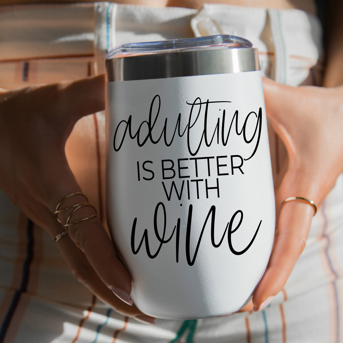 Gia Roma 17oz tumbler white with black script reading adulting is better with wine, clear lid on Tampa Home & Garden Store