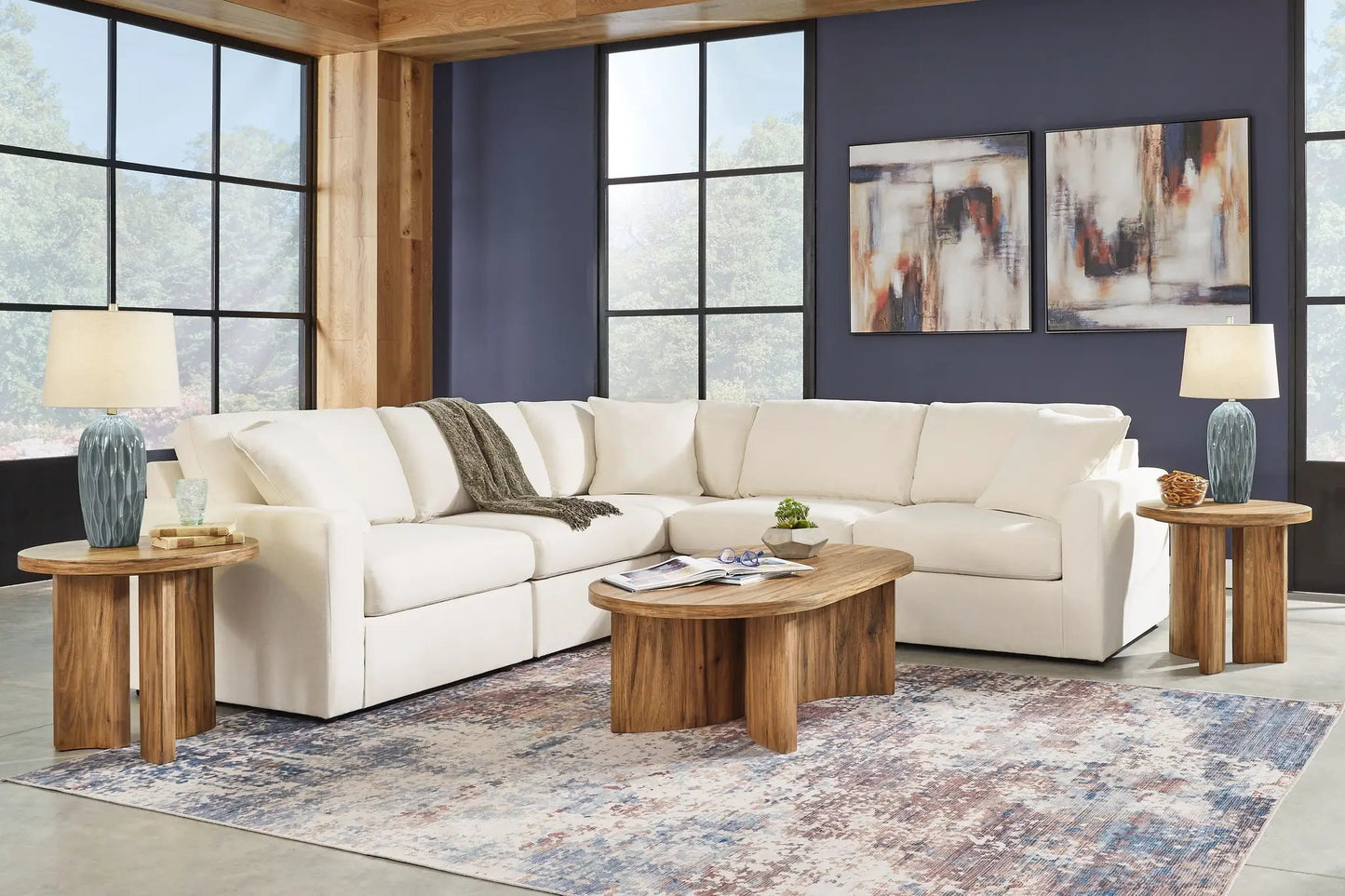 Modmax Sectional Oyster ivory fabric stationary sofa in a living room with dark blue wall on Tampa Home & Garden Store