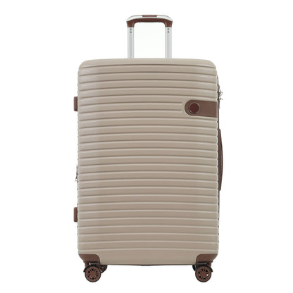Hard-shell beige luggage suitcase with brown trim, extended telescoping handle and four wheels on Tampa Home & Garden Store