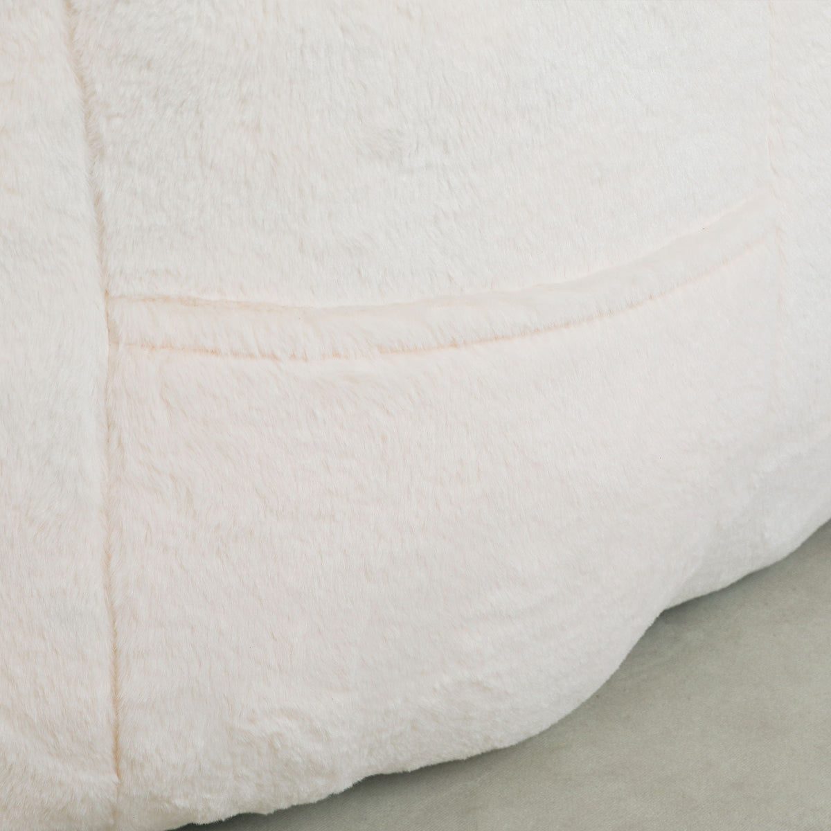 Beanbag chair in soft white plush fabric with stitched seams for cozy armchair look on Tampa Home & Garden Store