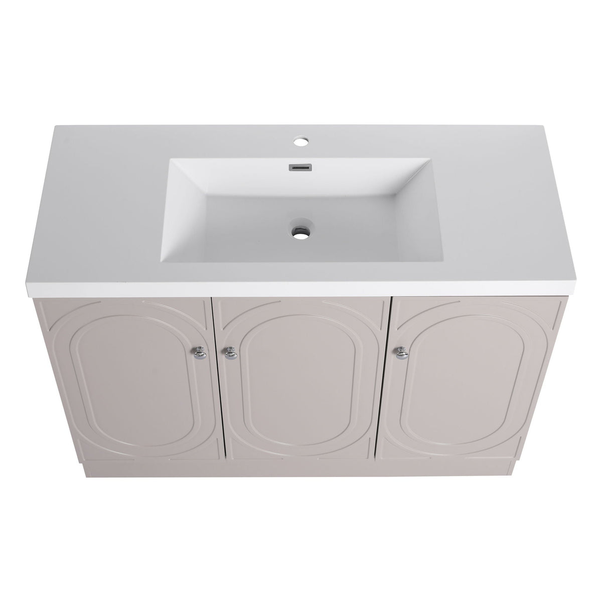 Freestanding vanity with resin sink, light gray top and two arched-panel cabinet doors on Tampa Home & Garden Store