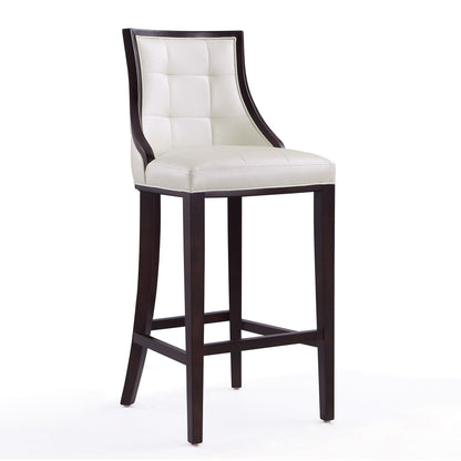 White bar-height stool with tufted white upholstery and dark solid wood frame 28–30 in on Tampa Home & Garden Store