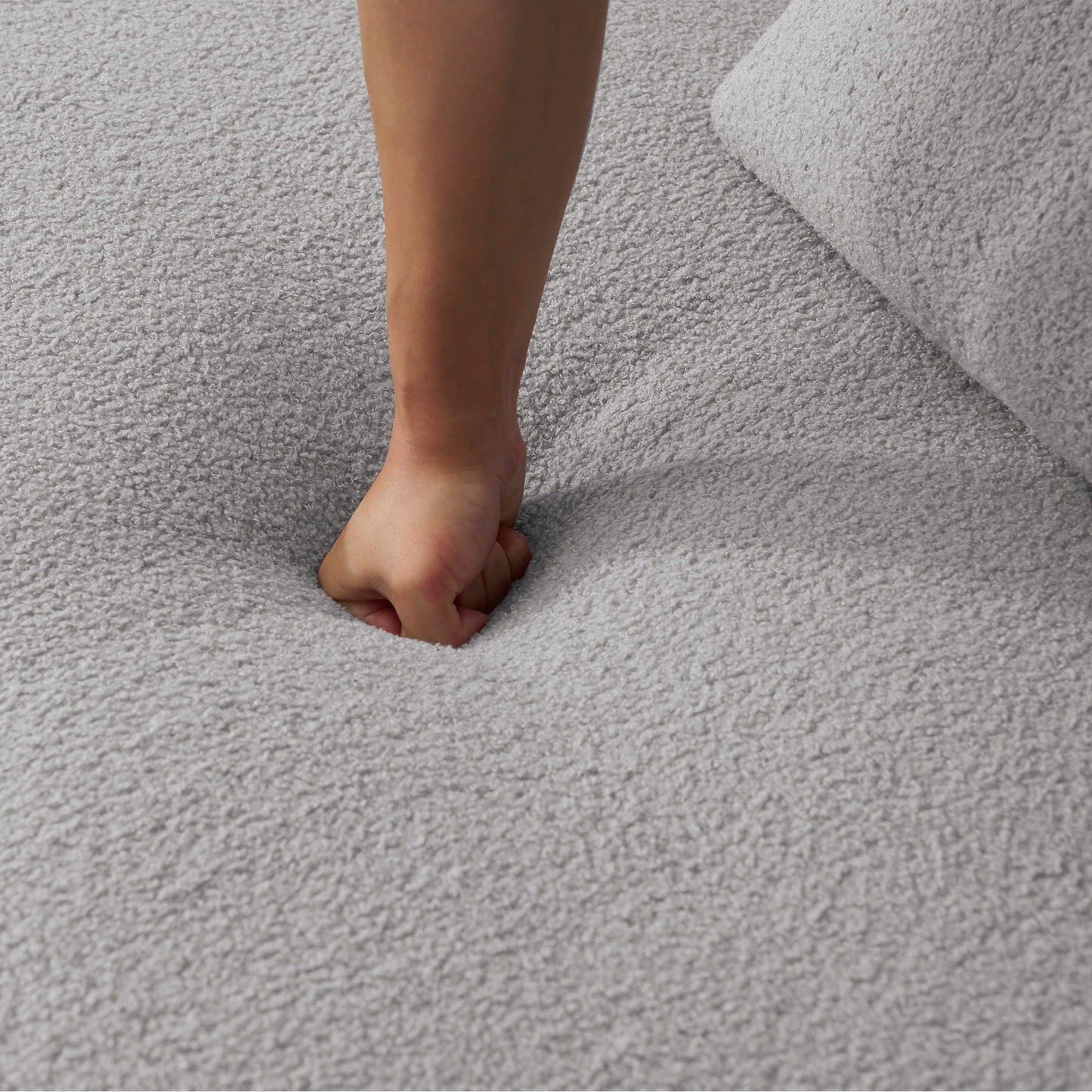 Curved 4 Seater Full Compression Sponge Sofa on gray carpet beside a gray sofa cushion on Tampa Home & Garden Store
