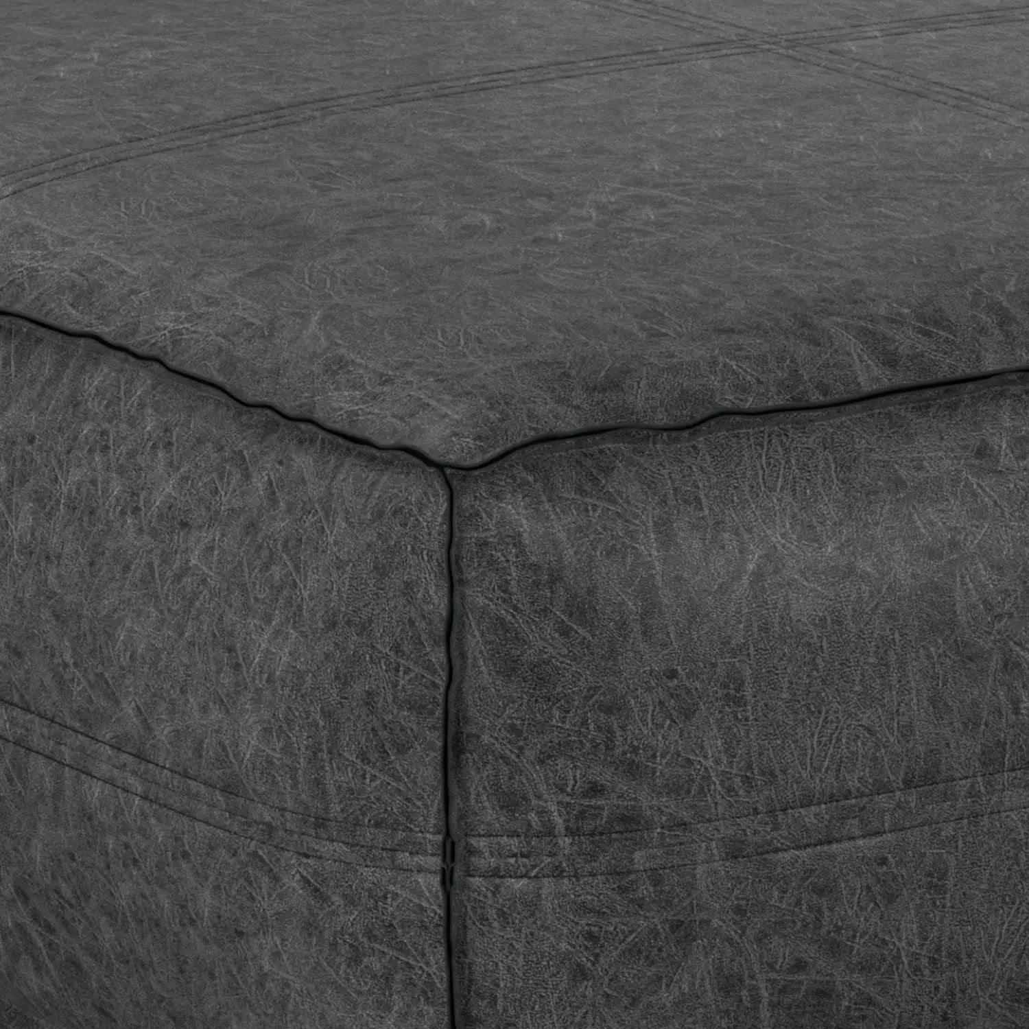 Brody large square coffee table pouf, dark gray faux leather with stitched panel seams on Tampa Home & Garden Store
