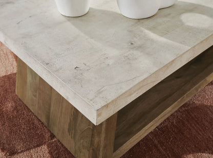 Brendalhouse rectangular cocktail table with concrete-look top and wood legs on Tampa Home & Garden Store