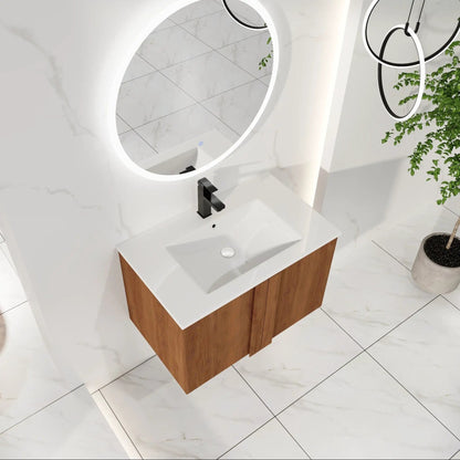 Floating vanity with white sink on wood cabinet, black faucet, circular LED mirror, marble walls on Tampa Home & Garden Store