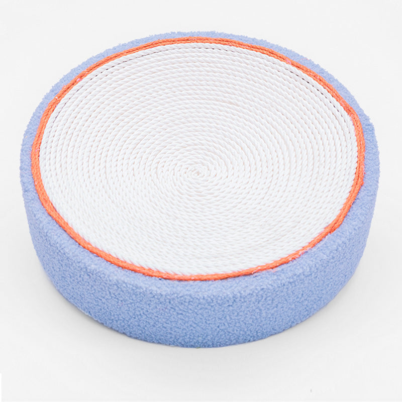 Corrugated cat scratcher bowl with white center, blue outer edge and orange rim on Tampa Home & Garden Store