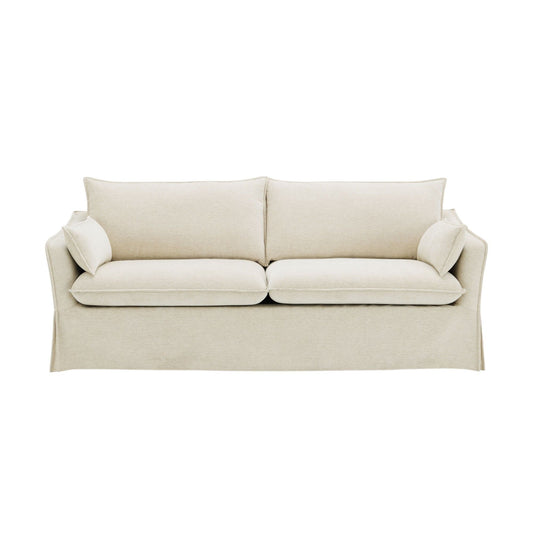 Shane beige sofa with 2 matching beige pillows, fabric upholstery, stationary style on Tampa Home & Garden Store