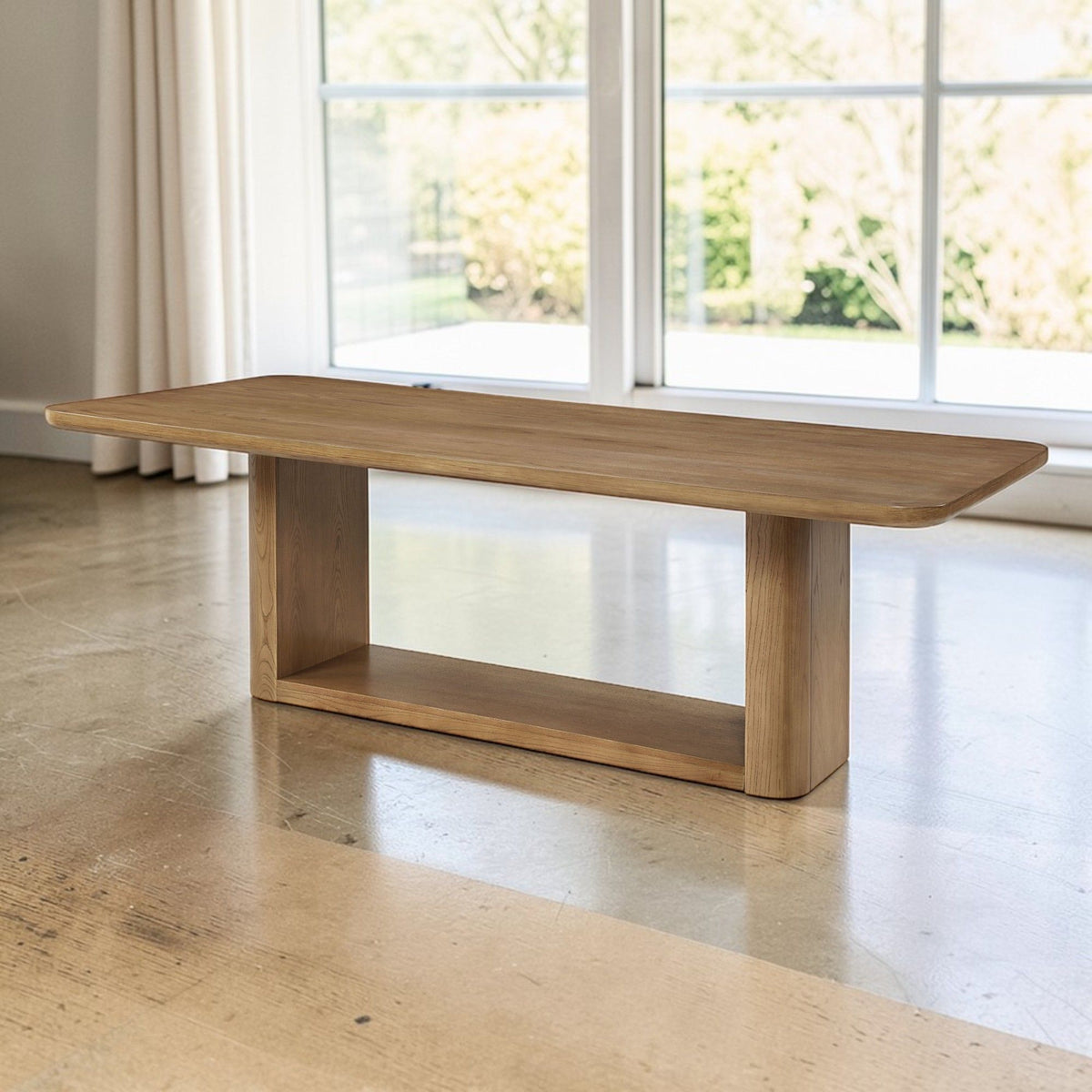 Oak dining table Zoey with dual-panel pedestal base in natural finish on Tampa Home & Garden Store