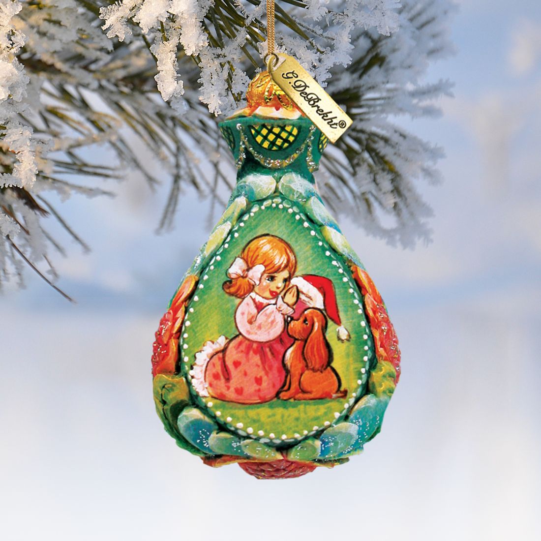 G.DeBrekht Secret Santa sculpted ornament green teardrop frame with girl and dog scene on Tampa Home & Garden Store