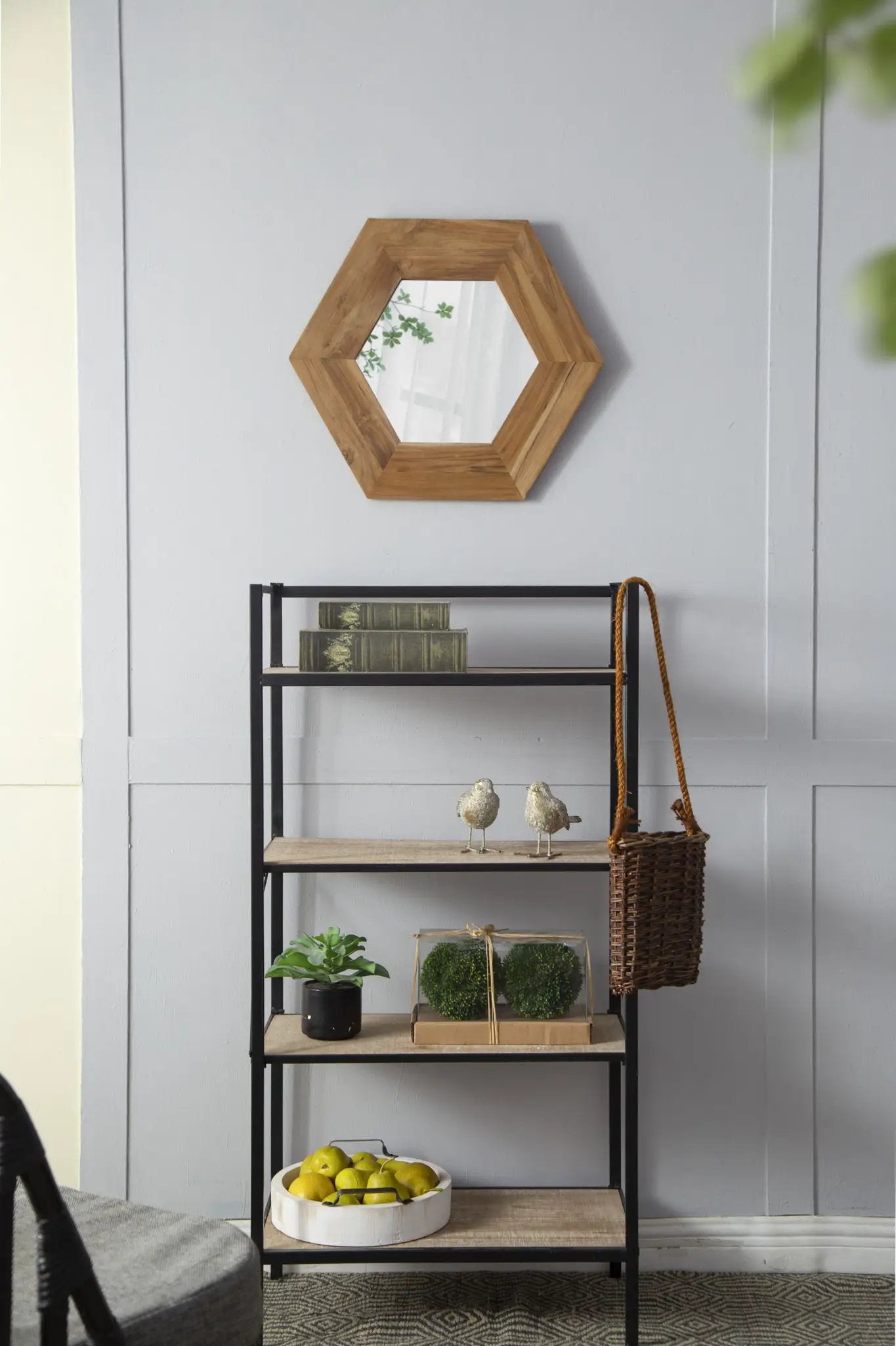 Hexagon wood-framed wall mirror with natural wood finish on Tampa Home & Garden Store
