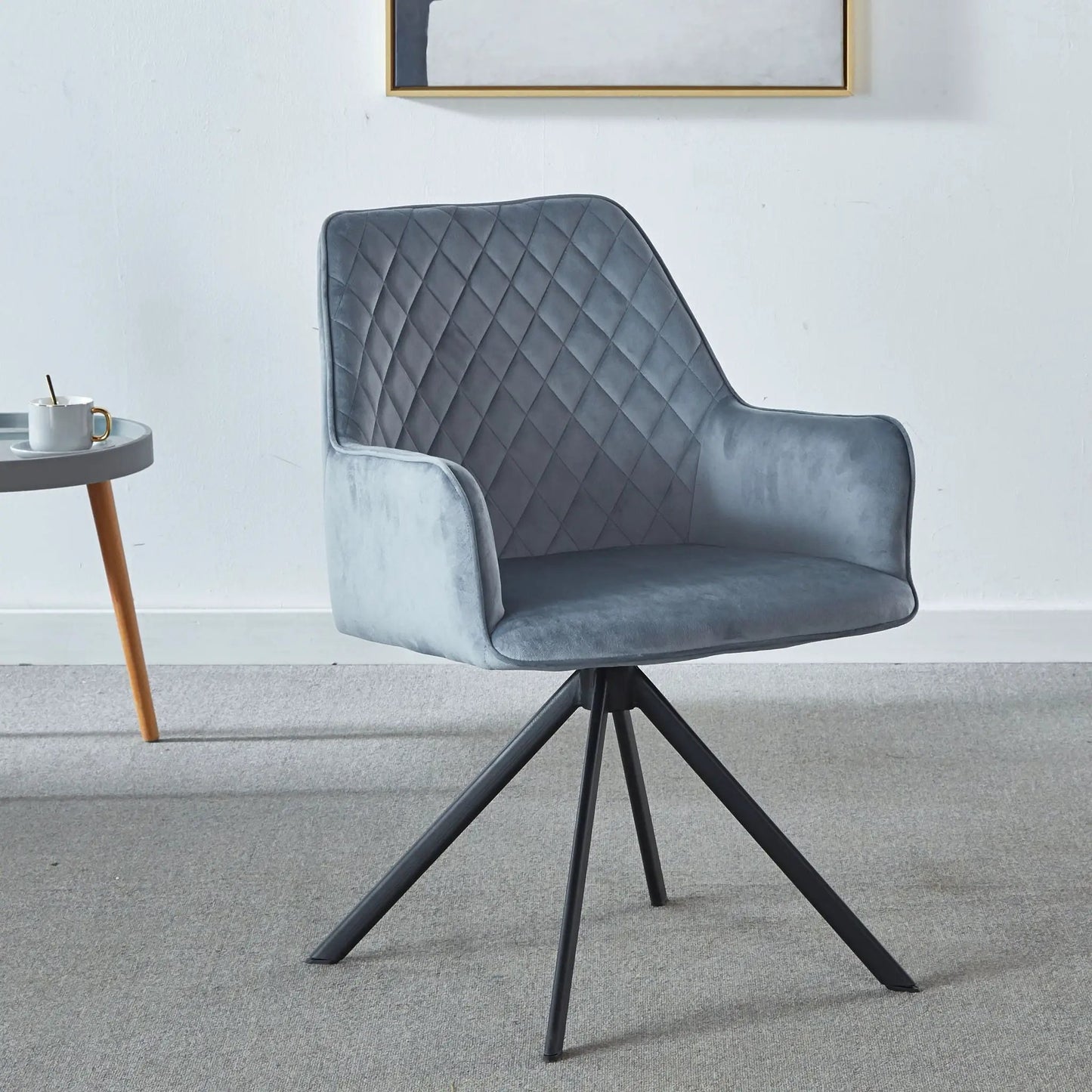 Blue quilted upholstered desk chair with metal five-point base and no wheels on Tampa Home & Garden Store