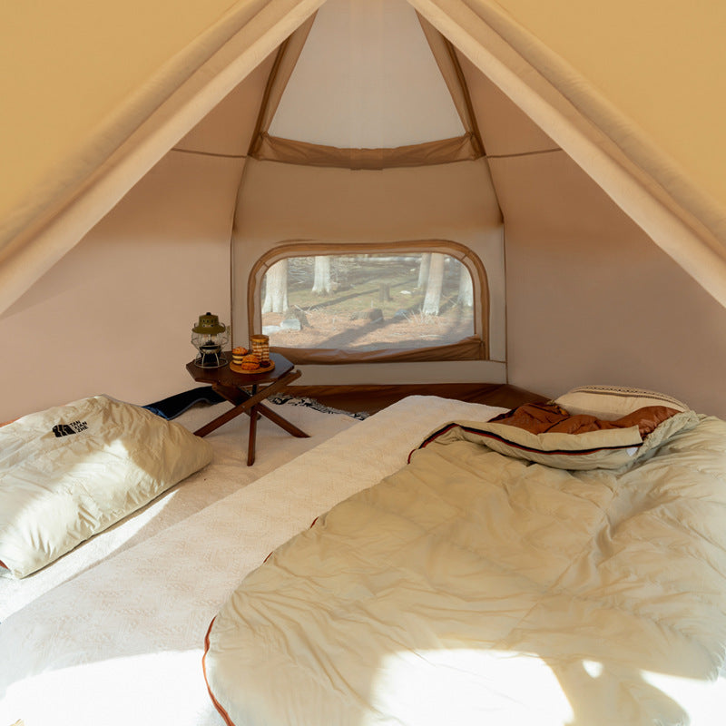 Outdoor camping tent interior with cream sleeping bags and tan bedding, My Store on Tampa Home & Garden Store