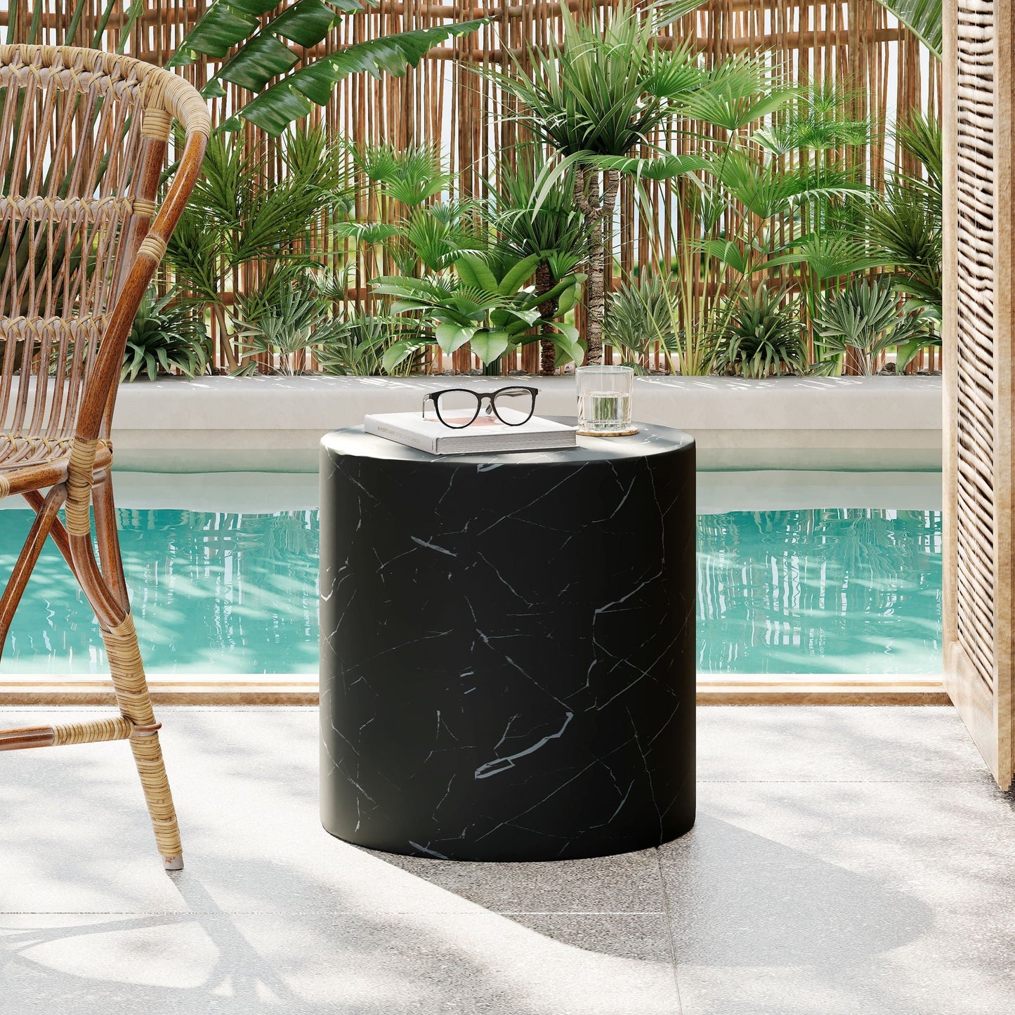Cylindrical outdoor side table by HouseOfZazla, black concrete with white veining on Tampa Home & Garden Store