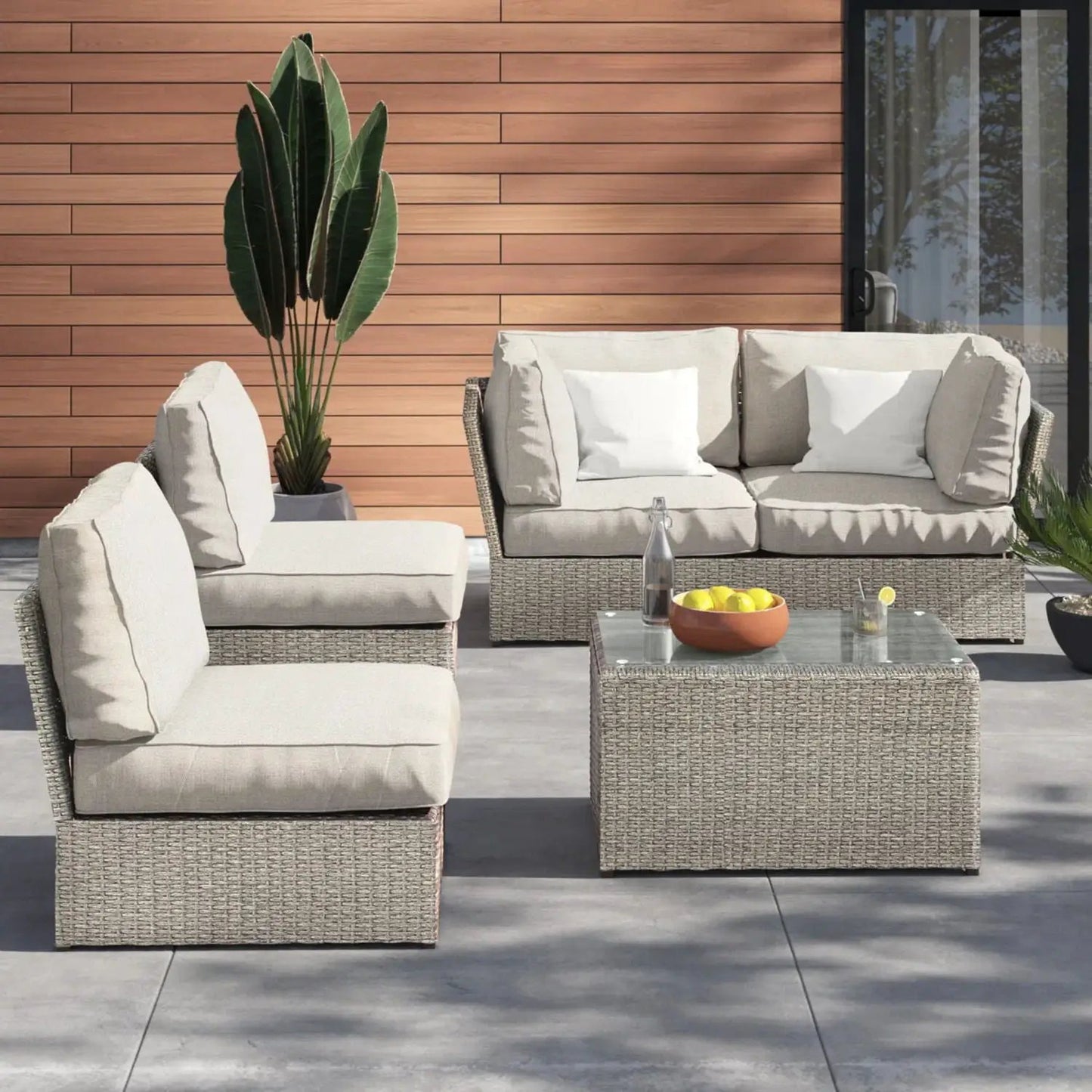 Stylish Modular Wicker Patio Seating Group 4-Piece Outdoor Set with beige cushions on Tampa Home & Garden Store
