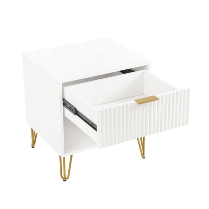 Modern white nightstand with a fluted drawer front, gold bar handle, and gold hairpin legs on Tampa Home & Garden Store