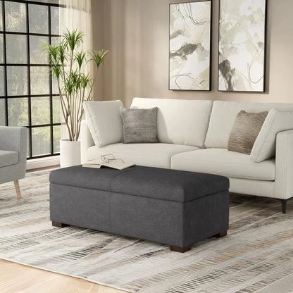 Gabbie storage ottoman by Unique Piece Furniture in charcoal gray upholstery with wooden legs on Tampa Home & Garden Store