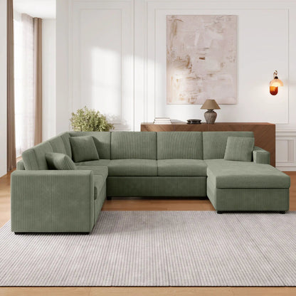 Oversized U-shaped sectional sofa in green fabric with chaise and three pillows on Tampa Home & Garden Store