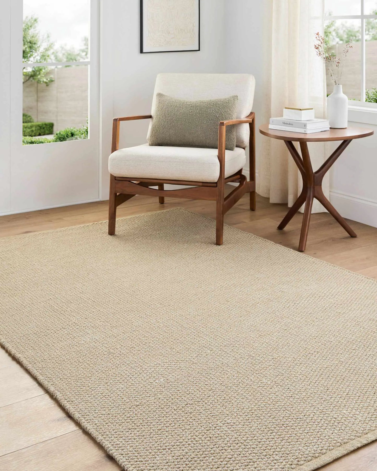 Cezary jute rug, natural beige woven rug in a living room setting, Boutique Rugs on Tampa Home & Garden Store
