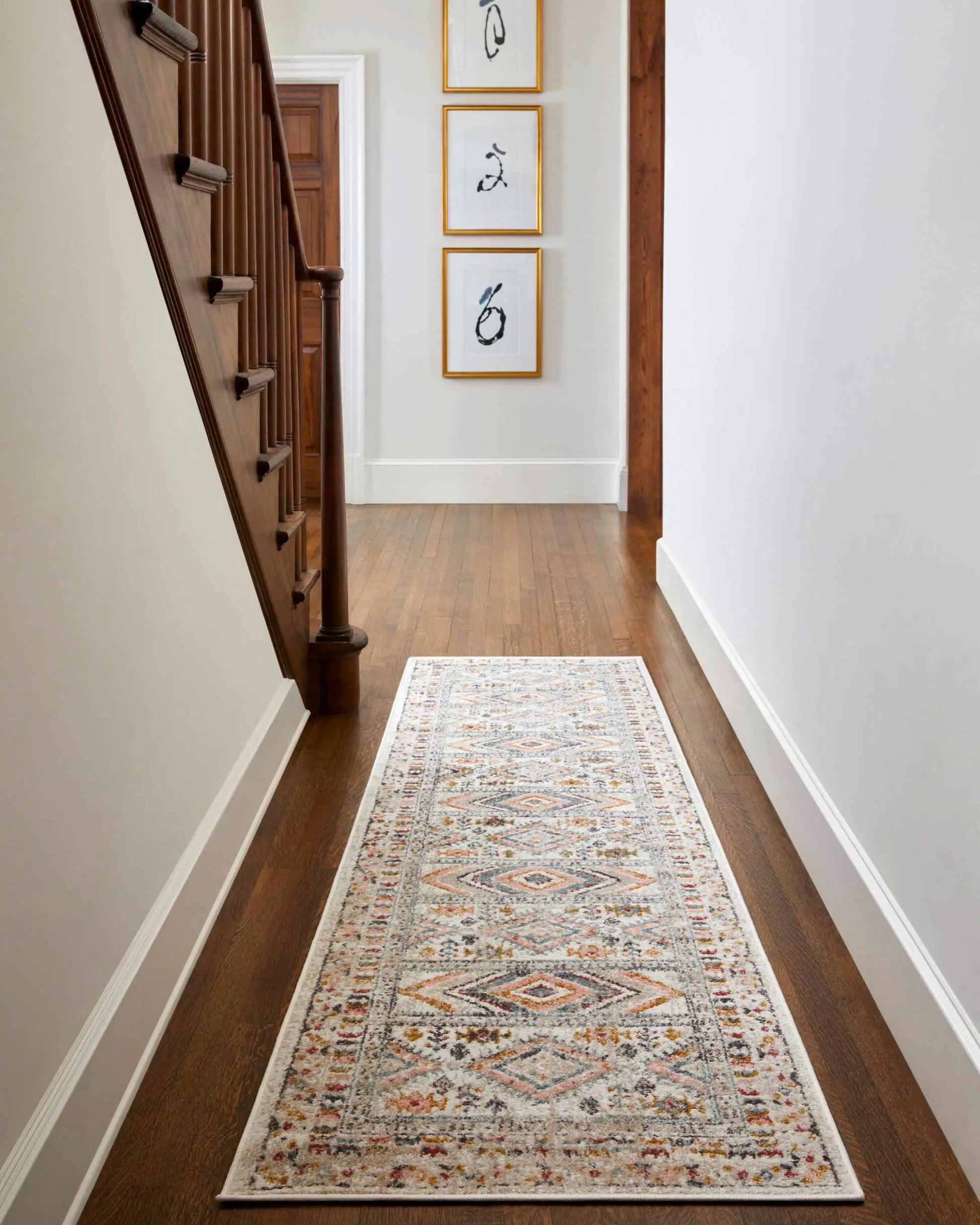 Diem Area Rug runner by Boutique Rugs with a colorful geometric motif on a cream background on Tampa Home & Garden Store