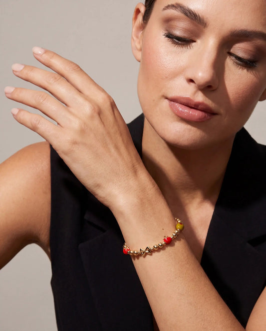 Pasta Girl Beaded Bangle by Alex and Ani, gold-tone beads with red accents and star charm on Tampa Home & Garden Store