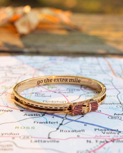 Road Trip Go The Extra Mile car fidget bracelet by Alex and Ani with crystal accents on map on Tampa Home & Garden Store