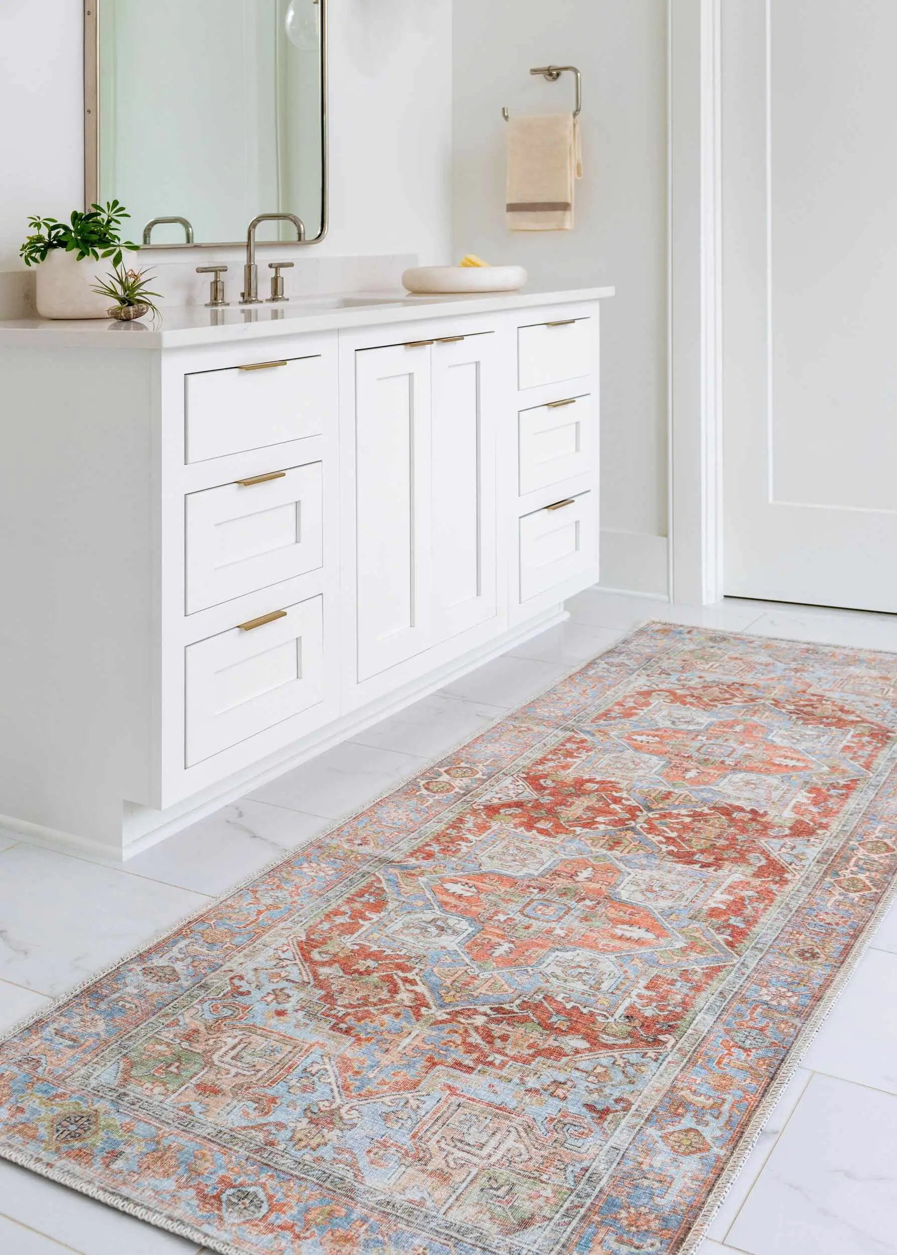 Rust Maayon washable rug by Boutique Rugs in rust orange with blue ivory oriental pattern on Tampa Home & Garden Store