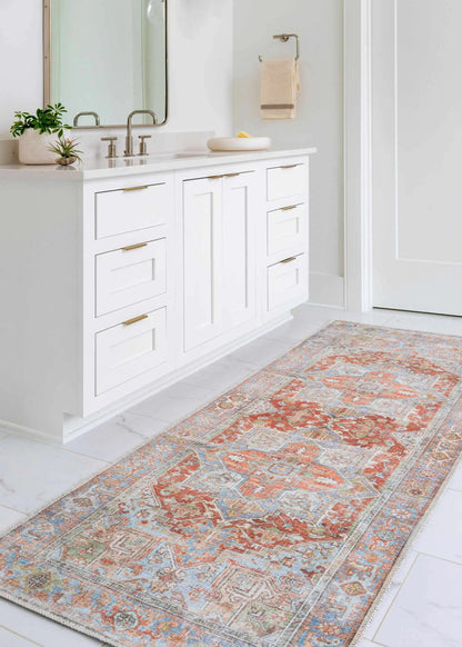 Rust Maayon washable rug by Boutique Rugs in rust orange with blue ivory oriental pattern on Tampa Home & Garden Store