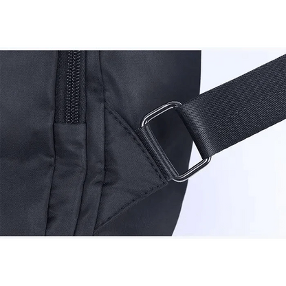 Amaznig anti-theft backpack in black waterproof fabric with a metal buckle strap close-up on Tampa Home & Garden Store