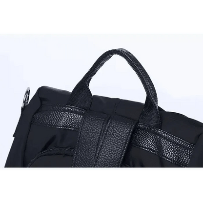 Stevvex black waterproof anti-theft laptop backpack with top handle and padded straps on Tampa Home & Garden Store