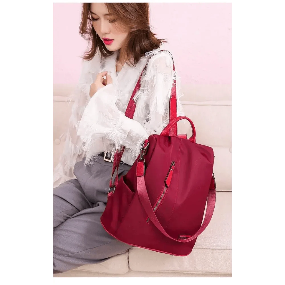 Stevvex red anti-theft backpack with zippered pockets and shoulder strap, large capacity on Tampa Home & Garden Store