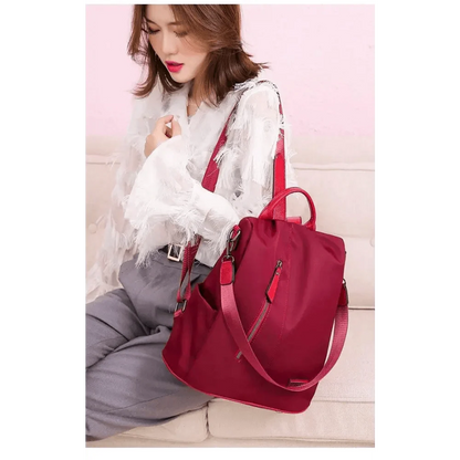 Stevvex red anti-theft backpack with zippered pockets and shoulder strap, large capacity on Tampa Home & Garden Store