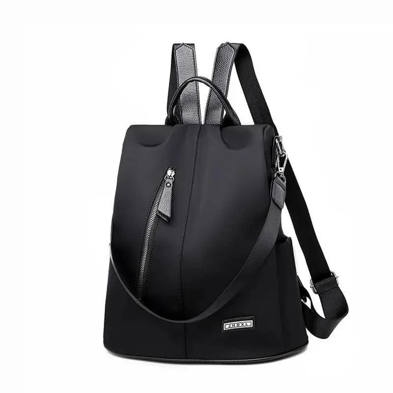 Stevvex black anti-theft backpack in waterproof fabric with front zipper pocket and top handle on Tampa Home & Garden Store