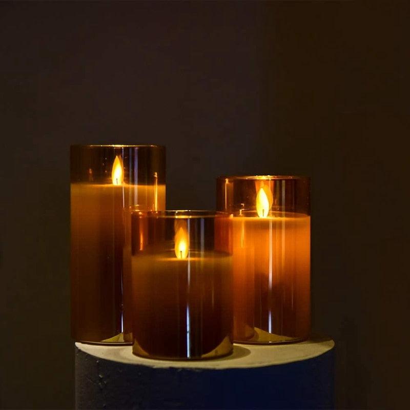 Amber glass LED flameless candle set of three with flickering moving wick on a stand on Tampa Home & Garden Store