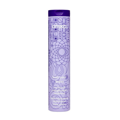 Amika Bust Your Brass Blonde Strength Repair Conditioner bottle with purple logo Tampa on Tampa Home & Garden Store