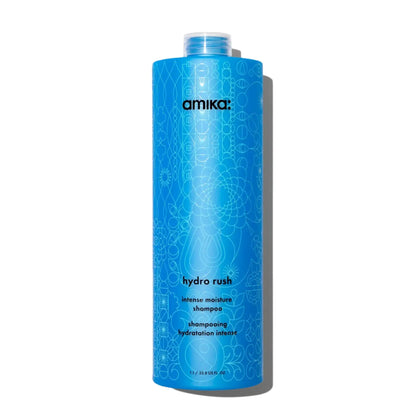 Amika Hydro Rush Intense Moisture Shampoo blue bottle with white geometric pattern amika logo on Tampa Home & Garden Store
