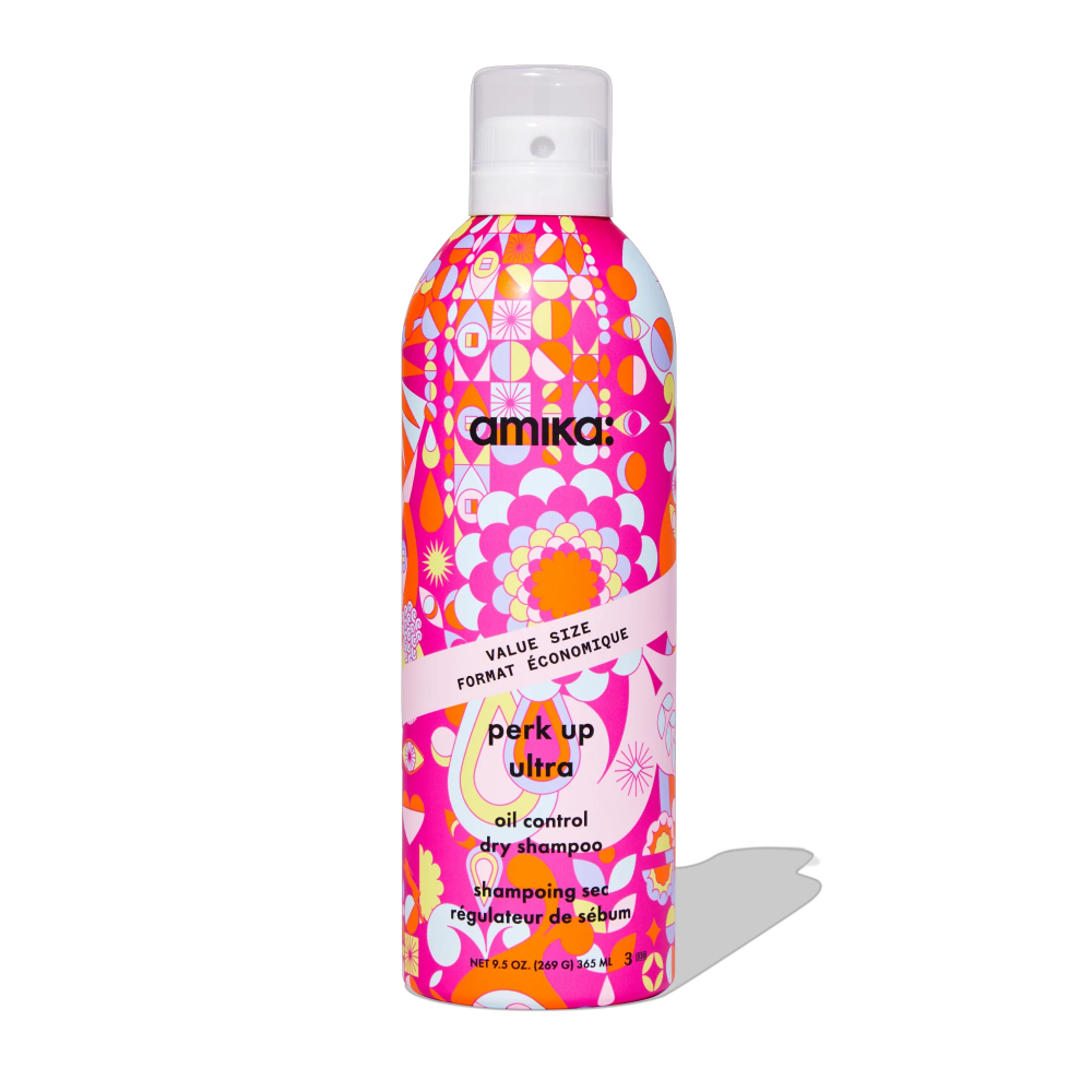Amika Perk Up Ultra Oil Control Dry Shampoo bottle, bright pink pattern and white cap on Tampa Home & Garden Store