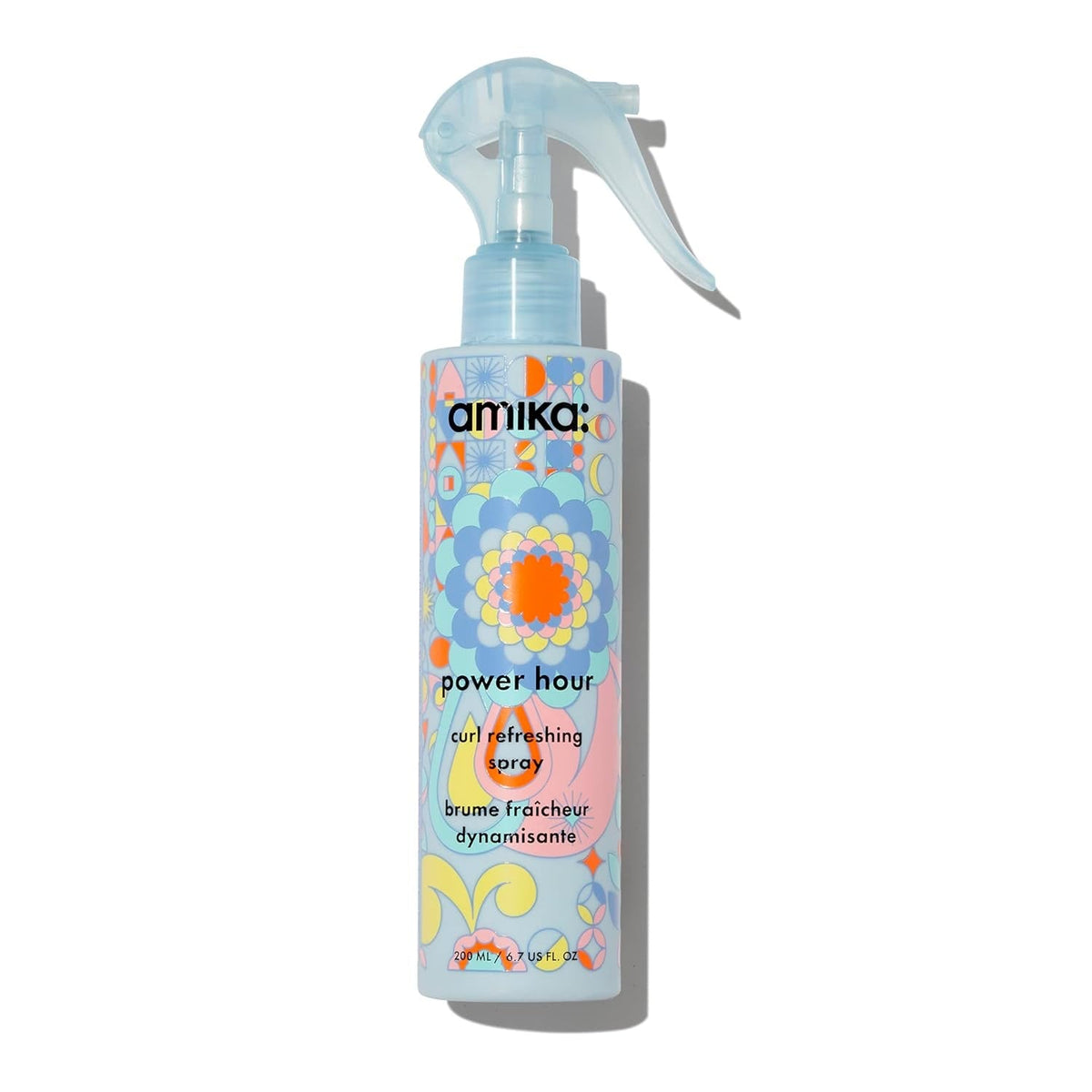 Amika Power Hour Curl Refreshing Spray bottle with pastel floral pattern, blue spray top, 6.7 oz on Tampa Home & Garden Store