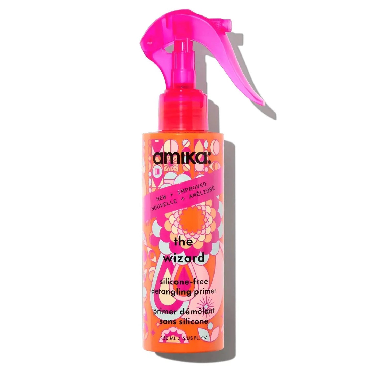 amika The Wizard silicone-free detangling primer bottle with pink spray top and floral label on Tampa Home & Garden Store