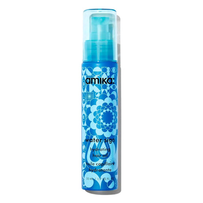 Amika Water Sign Hydrating Hair Oil bottle with blue geometric pattern and pump top on Tampa Home & Garden Store