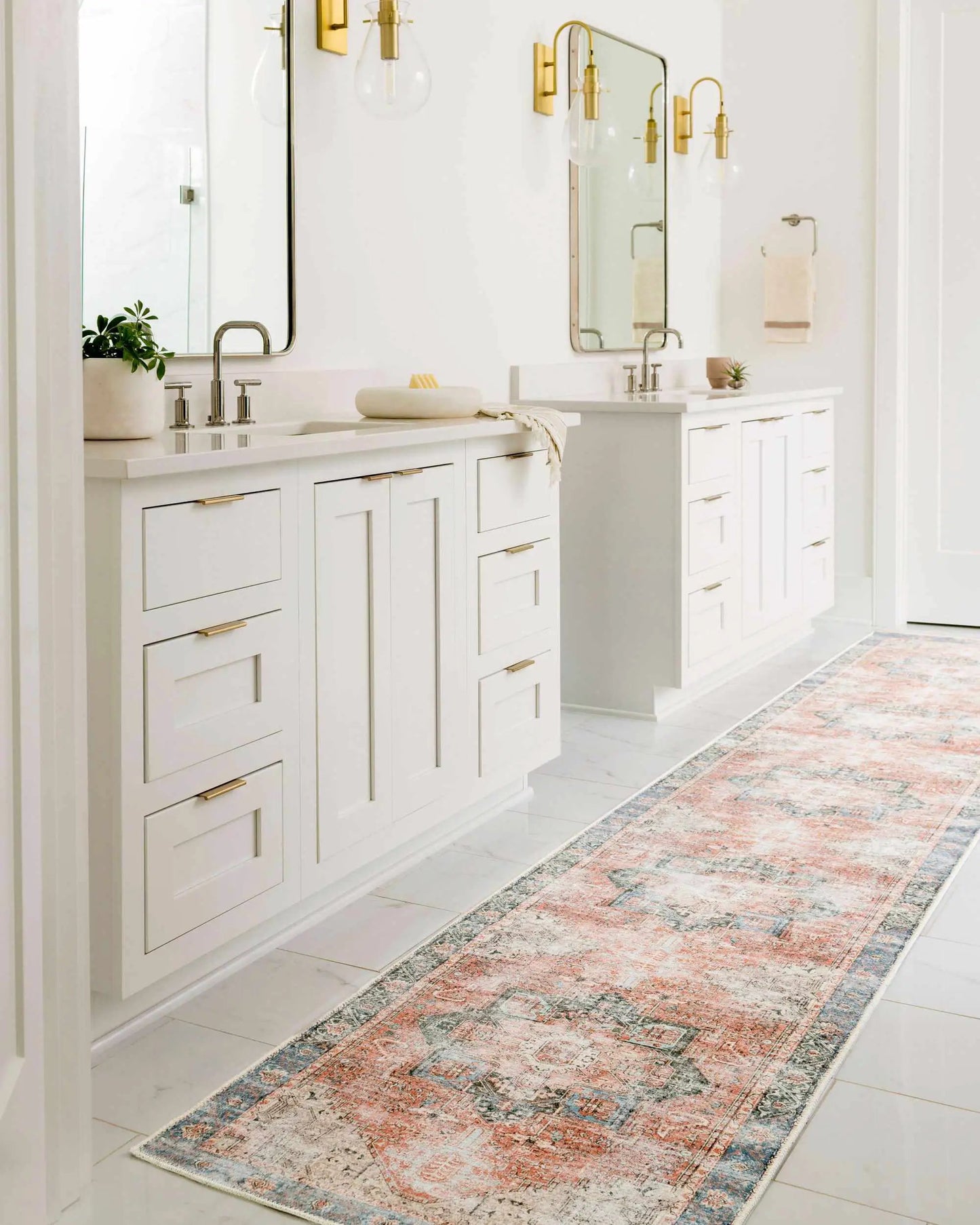 Boutique Rugs Rosman Distressed Washable Area Rug pink-blue faded pattern in white bath on Tampa Home & Garden Store