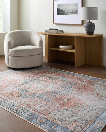 Rosman Distressed Washable Area Rug by Boutique Rugs in pink-blue-gray distressed pattern on Tampa Home & Garden Store