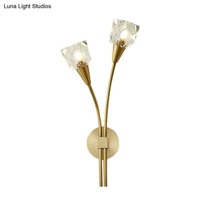 Gold twin-arm wall sconce with brass finish and crystal cube shades on Tampa Home & Garden Store