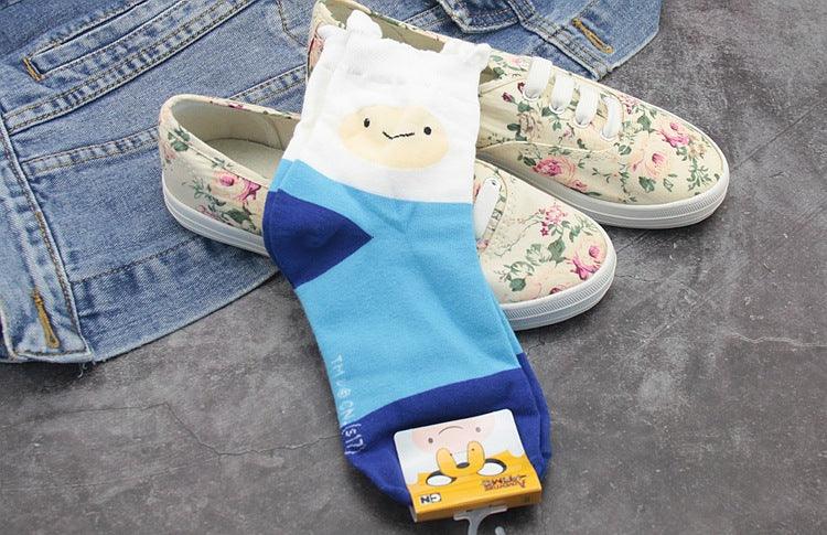 Stevvex Adventure Time crew socks with Ice King design in blue and white, packaged on Tampa Home & Garden Store
